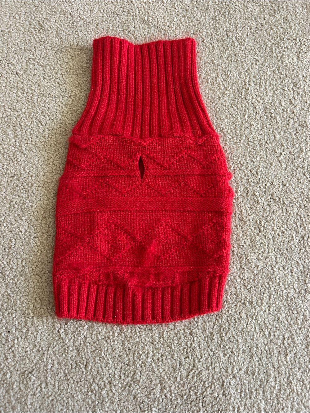 Red knit pet sweater with harness opening